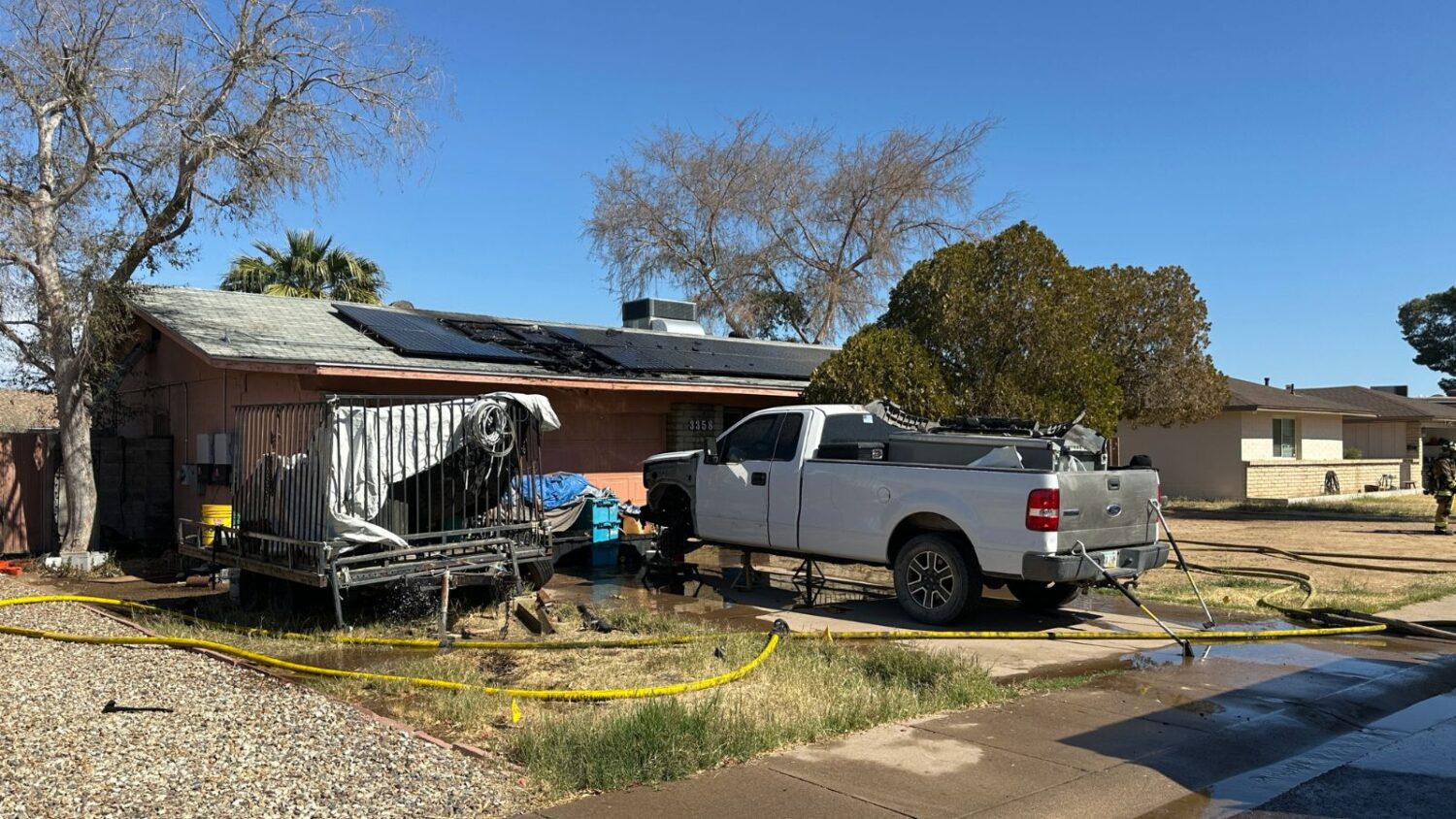 elderly man rescued from burning home Phoenix Arizona...