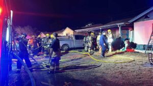 Woman hospitalized with burns after getting pulled from Phoenix house fire