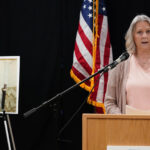 Karen Price sister of Ted Price (pictured off the left) speaks about the execution of Aaron Brian Gunches at the Arizona State Prison Wednesday, March 19, 2025 in Florence, Ariz. Gunches murdered Ted Price in 2002. (AP Photo/Darryl Webb)