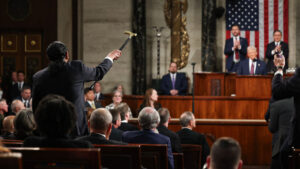 Democrat Al Green confronts Trump and is removed from House chamber during speech to Congress