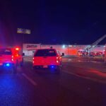 Crews work to extinguish a Phoenix tire shop fire.