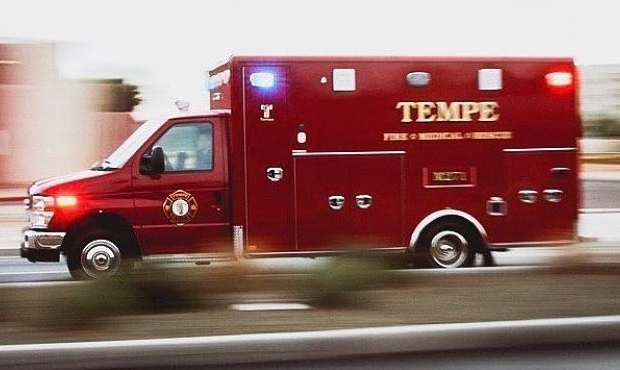 Two drivers were hospitalized after a car crashed into a Tempe apartment complex on Wednesday, auth...