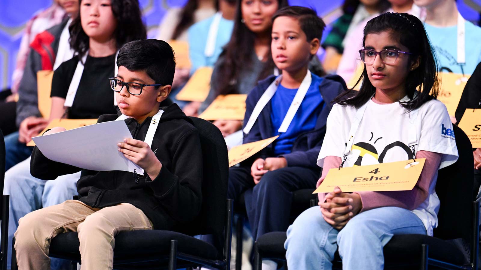 Valley students Sumukh Tirumalasetty, from left, and Esha Marupudi, front right, await their turn d...