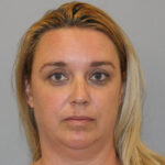 Sheena Holmes was sentenced to prison for embezzling from an Arizona charity and business.