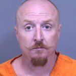 Justin Creed is accused of fatally shooting his ex-wife at Desert Ridge Marketplace.
