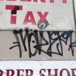 A sign with graffiti is seen on Oct. 2, 2024, in Phoenix. (Maricopa County Attorney's Office photo)