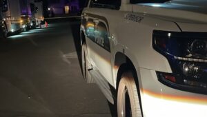 Pedestrian dead crossing street in south Phoenix, car driver injured