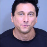 Julian Nixon is accused of making secret recordings of women having sex with him at his Scottsdale home.