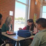 Governor Katie Hobbs visits Madison Park Middle School to highlight school lunch funding. (Shira Tanzer/KTAR News)