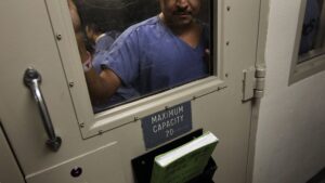 Sen. Mark Kelly talks with 2 mothers detained at ICE detention center in Eloy