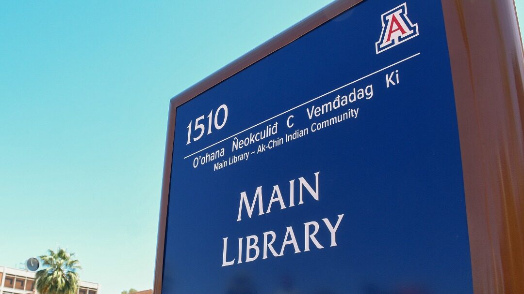 A woman is in the hospital and a man is in custody after a stabbing at a library on the University ...