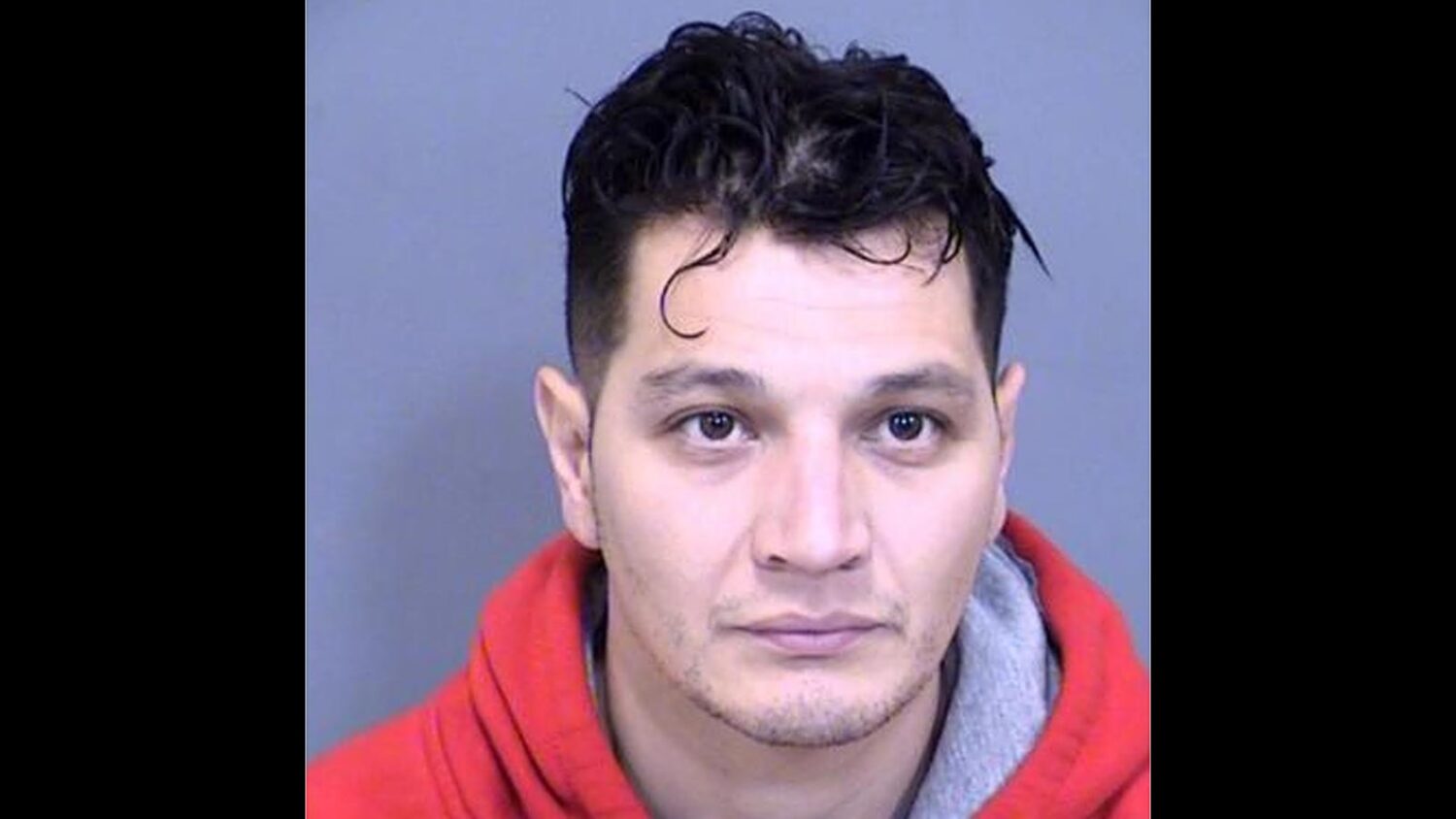 Jesus Preciado Dousten was arrested after a bystander was killed by a bullet fired during a road ra...