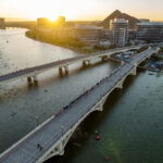 Racers run on bridges over Tempe Town Lake during Ironman Arizona triathlon. (Ironman photo)