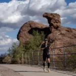 Racer runs through Papago Park during Ironman Arizona triathlon. (Ironman photo)