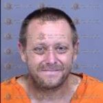 Lyle Dennis Harmon Jr. allegedly crashed a stolen Humvee into a parked Scottsdale police vehicle. (MCSO photo)