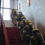 Students practice moving in their gear at Coronado High School’s new Fire Science Academy. (Shira Tanzer/KTAR News)
