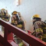Students practice moving in their gear at Coronado High School’s new Fire Science Academy. (Shira Tanzer/KTAR News)