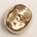 This is the gold tooth donated in 2021. (The Salvation Army Southwest Division photo)