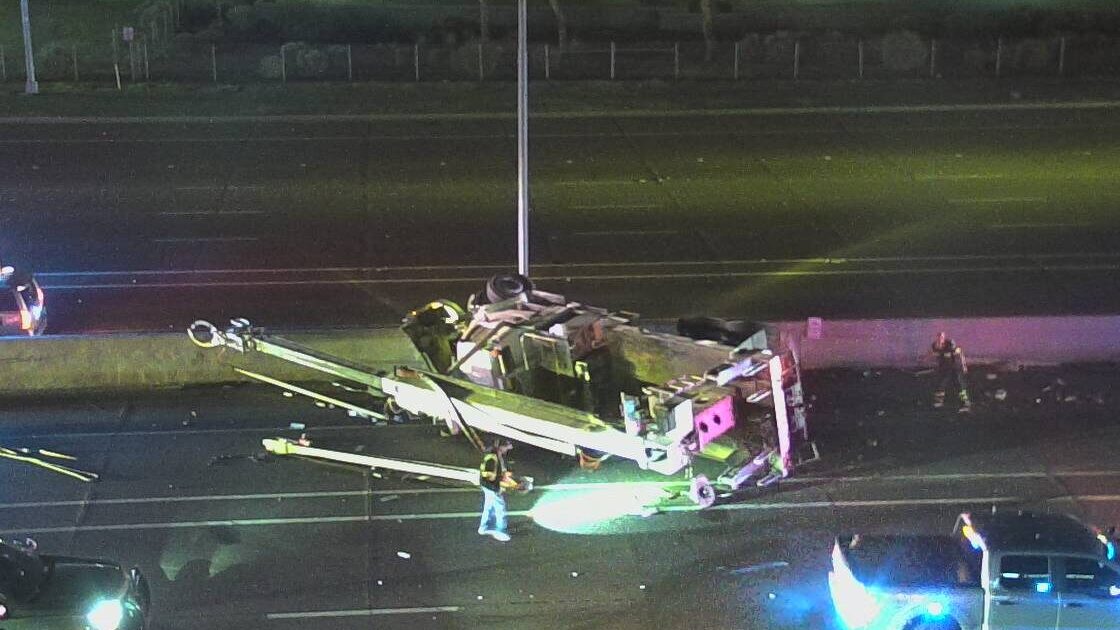 A utility truck was involved in a rollover crash on I-10 near Chandler Boulevard on Wednesday morni...