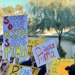 SUSD students picket outside of a board meeting against proposed closures. (Ellie McKnight)