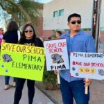 SUSD students picket outside of a board meeting against proposed closures. (Ellie McKnight)