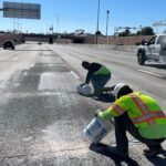 Crews put the finishing touches on a new northbound lane on the Loop 101 Pima Freeway in Scottsdale. (ADOT photo)