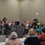 Scottsdale Unified parents and kids ask the governing board to keep their schools open. (Shira Tanzer/KTAR News)