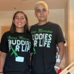 Mila Russo, left, and JP Russo stand together at Phoenix Children’s Hospital wearing their “Bone Marrow Buddies for Life” shirts shortly before JP’s first transplant of stem cells. (Photo courtesy of Russo family)