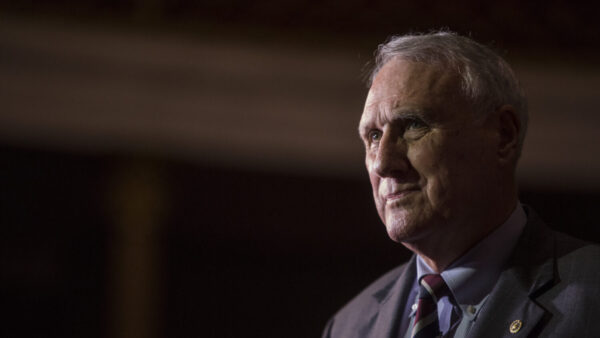 U.S. Sen. John Kyl (R-AZ) awaits Vice President Mike Pence before a mock swear-in ceremony on Sept. 5, 2018, in Washington, DC. The former senator Kyl was tapped by Arizona Gov. Doug Ducey to replace the late Sen. John McCain. (Photo by Zach Gibson/Getty Images)