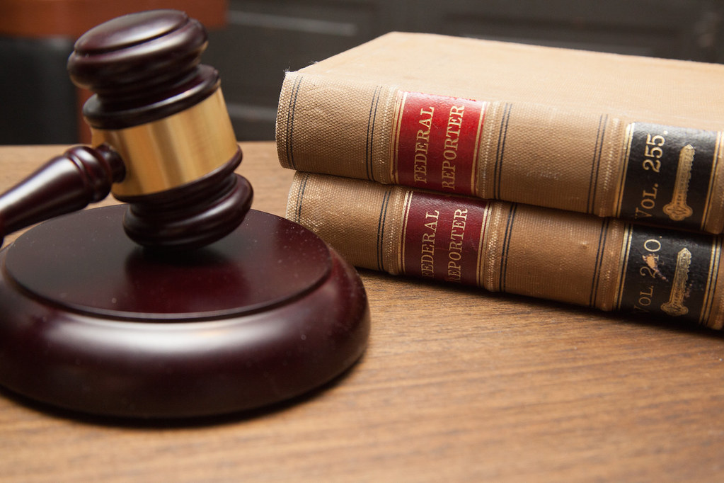 U.S. Attorney Timothy Courchaine announces a $4.75 million DOJ settlement with Tri-City Cardiology ...