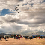 The U.S. Air Force F-16 Fighting Falcons, assigned to the U.S. Air Force Demonstration team, the "Thunderbirds," execute a carefully choreographed demonstration during the Luke Days airshow on March 22, 2024, at Luke Air Force Base, Arizona. The pilots perform approximately 30 maneuvers in a demonstration, and the entire show, including ground and air, runs about an hour and fifteen minutes. (U.S. Air Force photo by Senior Airman Elias Carrero)