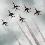 The U.S. Air Force F-16 Fighting Falcons, assigned to the U.S. Air Force Demonstration team, the "Thunderbirds," execute a carefully choreographed demonstration during the Luke Days airshow on March 24, 2024, at Luke Air Force Base, Arizona. The Thunderbirds were officially activated June 1, 1953, as the 3600th Air Demonstration Team at Luke AFB, over 70 years ago. (U.S Air Force Photo by Airman 1st Class Katelynn Jackson)