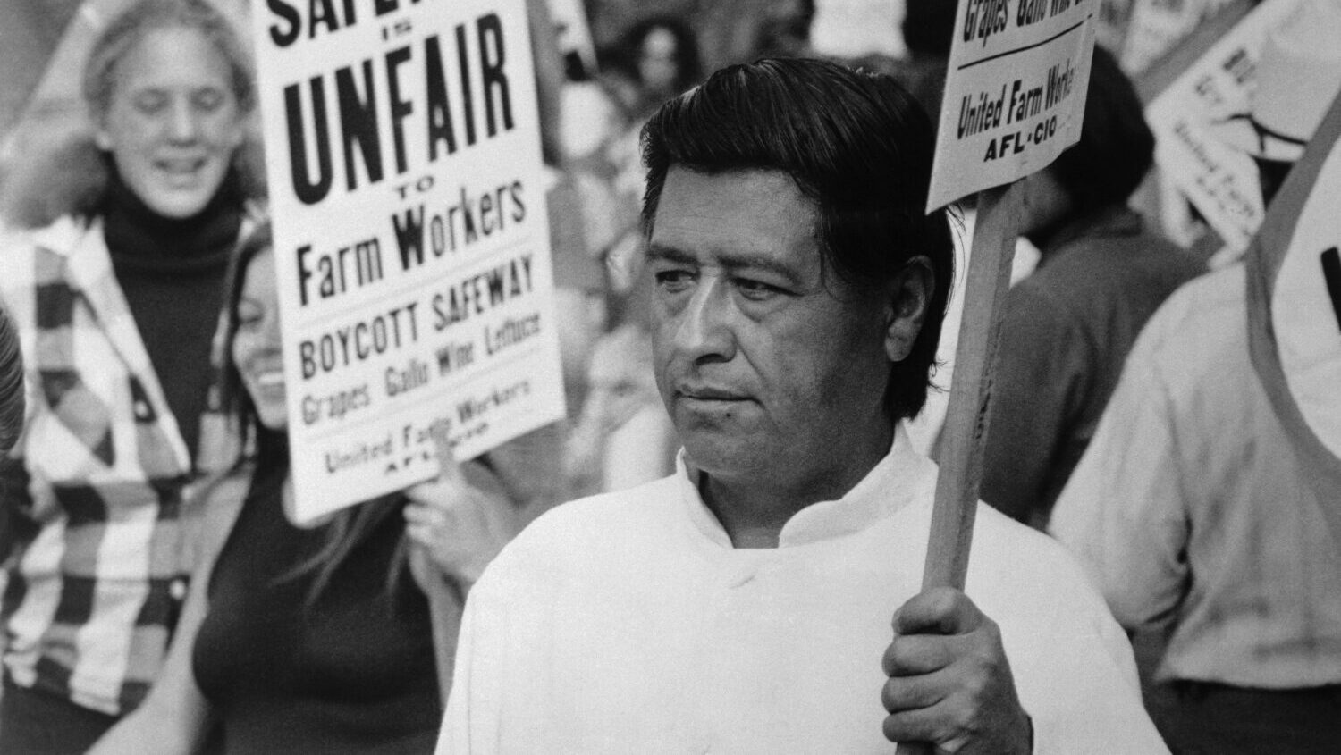 Farm labor leader Cesar Chavez pickets here outside San Diego area headquarters of Safeway markets....