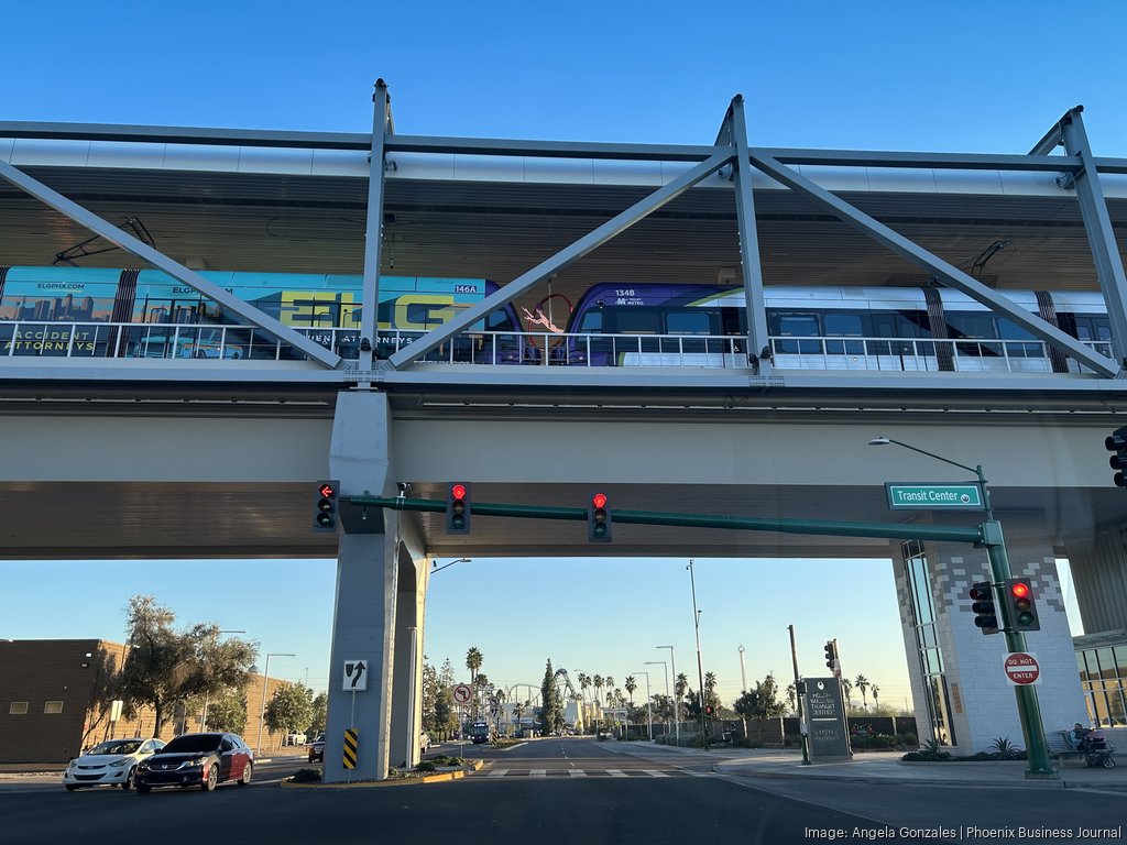The Valley Metro light rail extension ends at The Metropolitan mixed-use district, a $1 billion red...