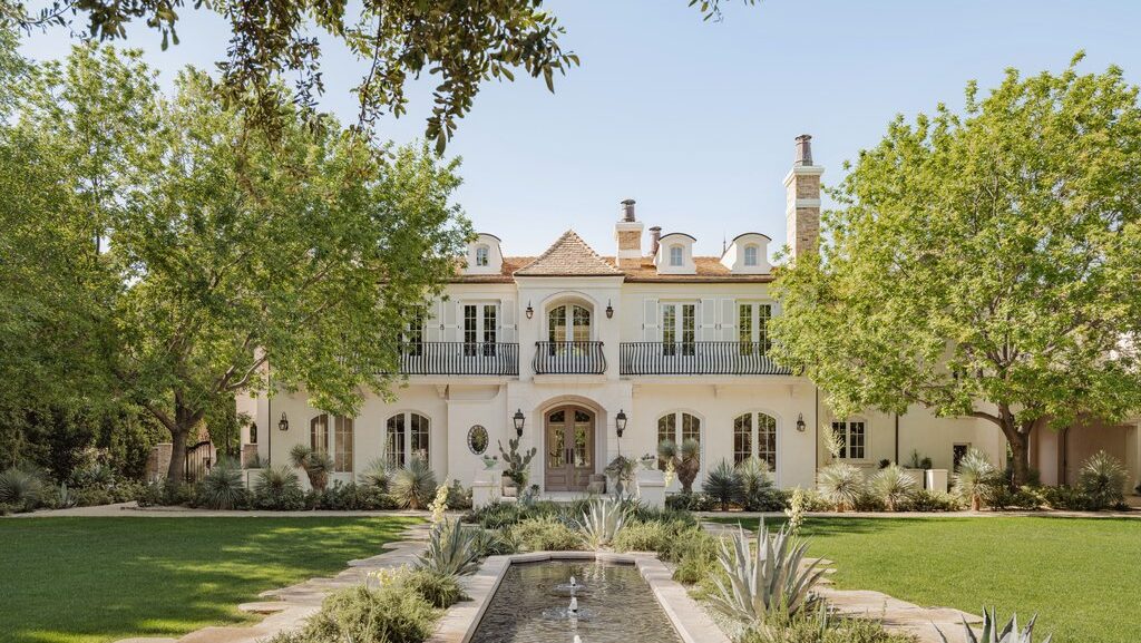 Listed for $18.5 million in January, this 8,434-square-foot estate at 6415 E. Exeter Blvd., Arcadia...