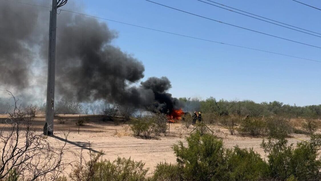 Crews from multiple fire departments were working to contain a brush fire in the West Valley on Wed...