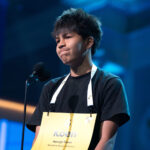 Koen Harvey, 14, of Tsaile, Ariz., spells his word during the preliminary round of the Scripps National Spelling Bee at DAR Constitution Hall, Tuesday, May 26, 2026, in Washington. (AP Photo/Jose Luis Magana)