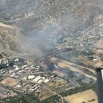 The Jones Fire burns more than 100 acres along both sides of U.S. 60 and the Hassayampa River bottom near Wickenburg on Monday, prompting evacuation orders and road closures. (Photo via AZ Dept. of Forestry and Fire Management)
