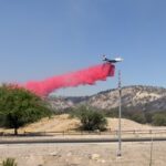 The Jones Fire burns more than 100 acres along both sides of U.S. 60 and the Hassayampa River bottom near Wickenburg on Monday, prompting evacuation orders and road closures. (Photo via AZ Dept. of Forestry and Fire Management)