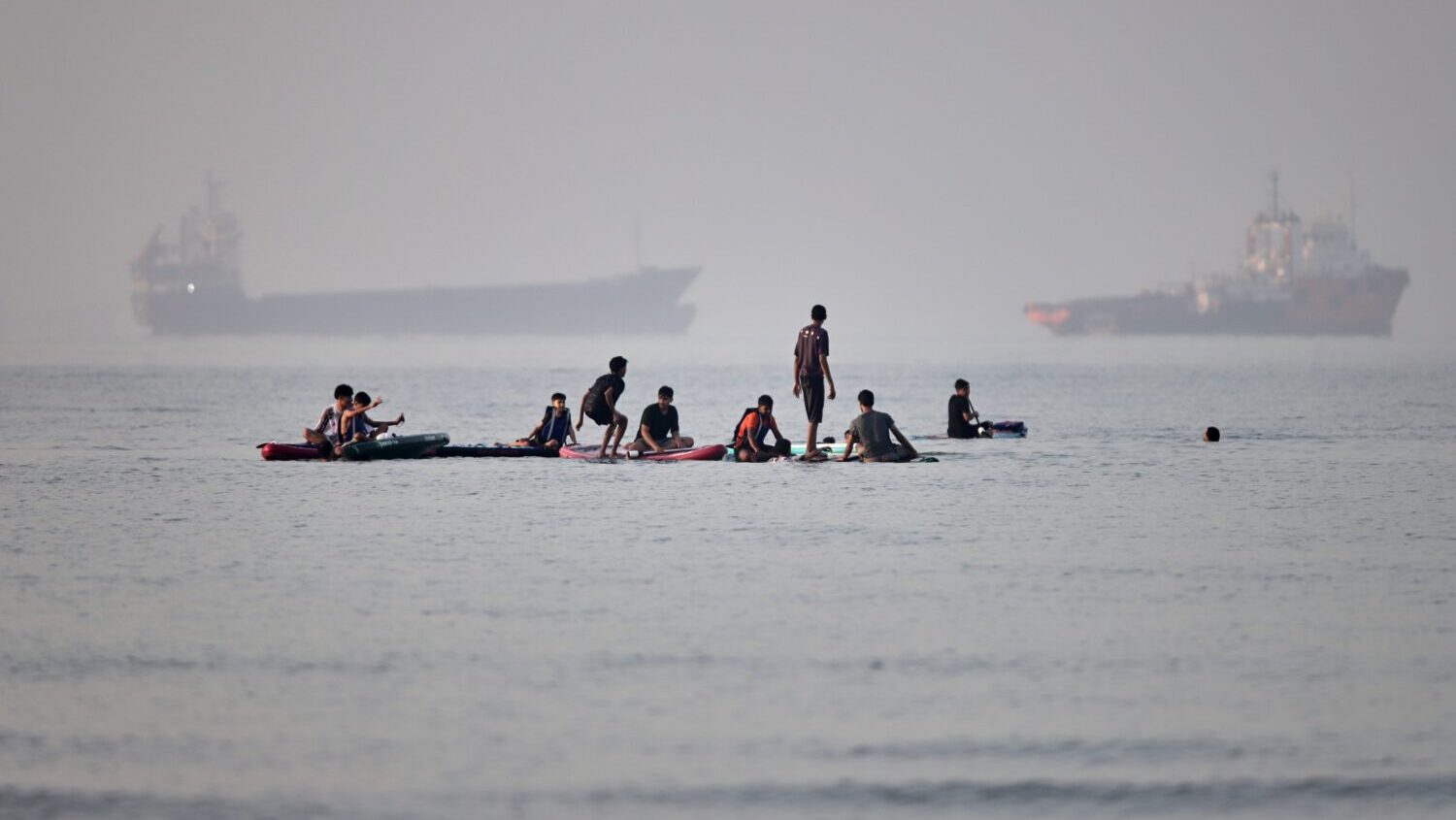 Iran fired ballistic missiles and drones toward Bahrain and Kuwait that were intercepted early Satu...