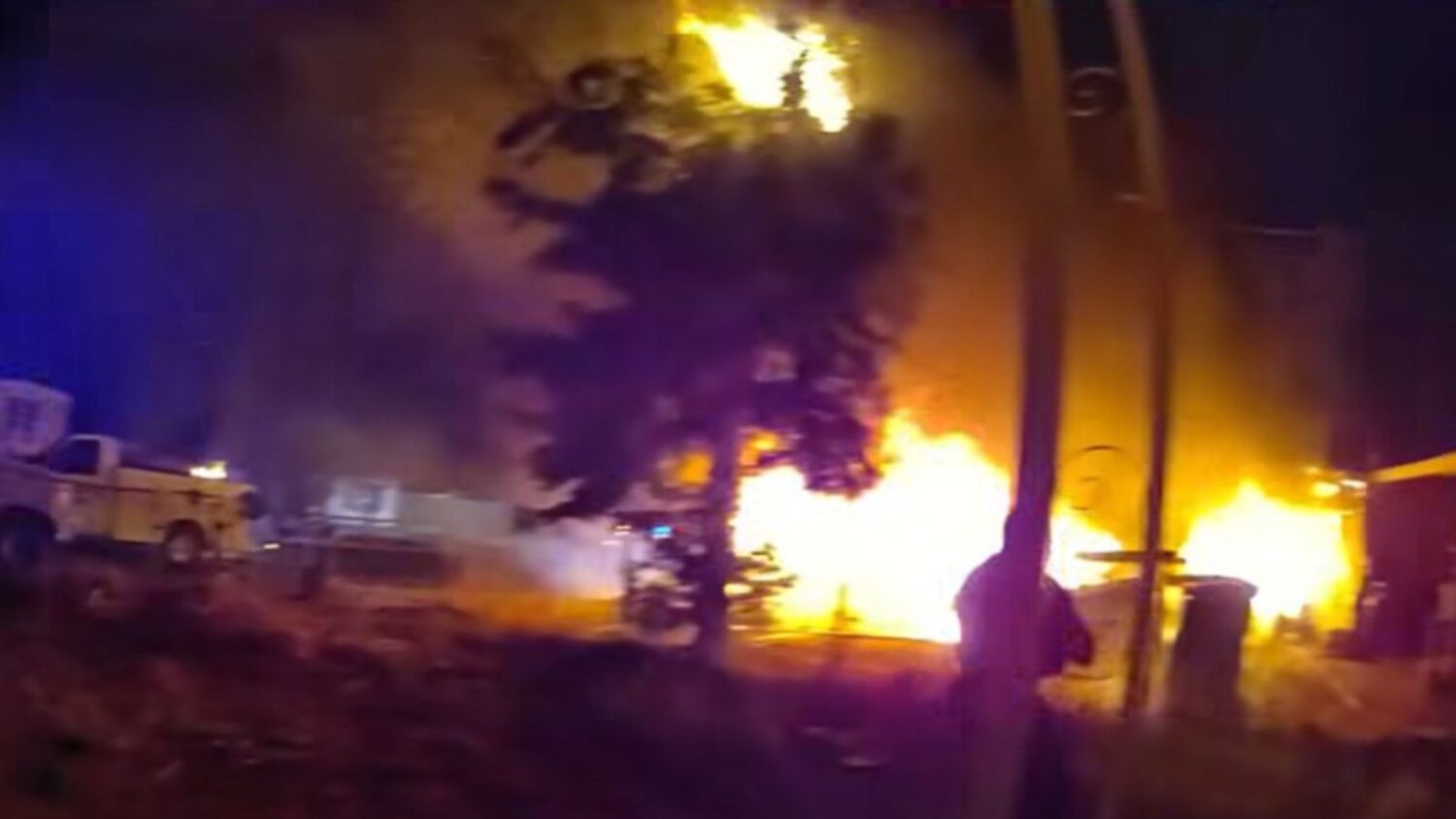 burning home rescue Mesa police hospitalized...