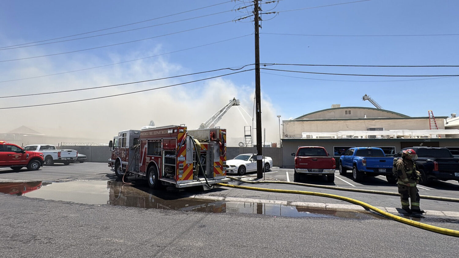 A scrapyard fire in west Phoenix sent smoke billowing into the sky Thursday afternoon. (Phoenix Fir...