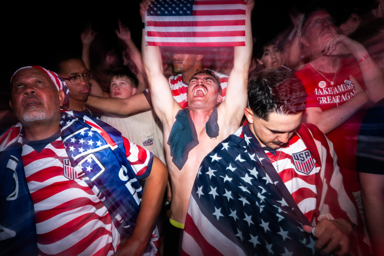 People attend a watch party for a World Cup soccer match between the United States and Bosnia Wedne...