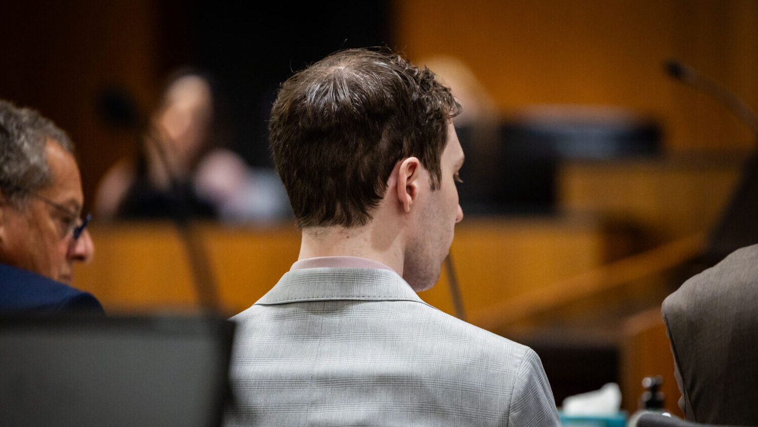 Tyler Robinson, accused in the fatal shooting of Charlie Kirk, listens during a preliminary hearing...
