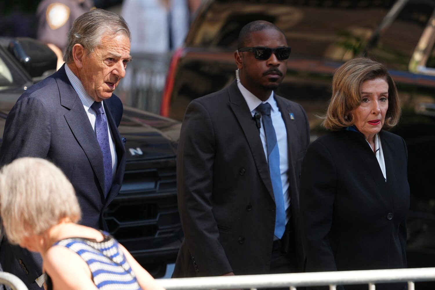 Rep. Nancy Pelosi, D-Calif., and her husband Paul arrive at the funeral services for Clive Davis at...