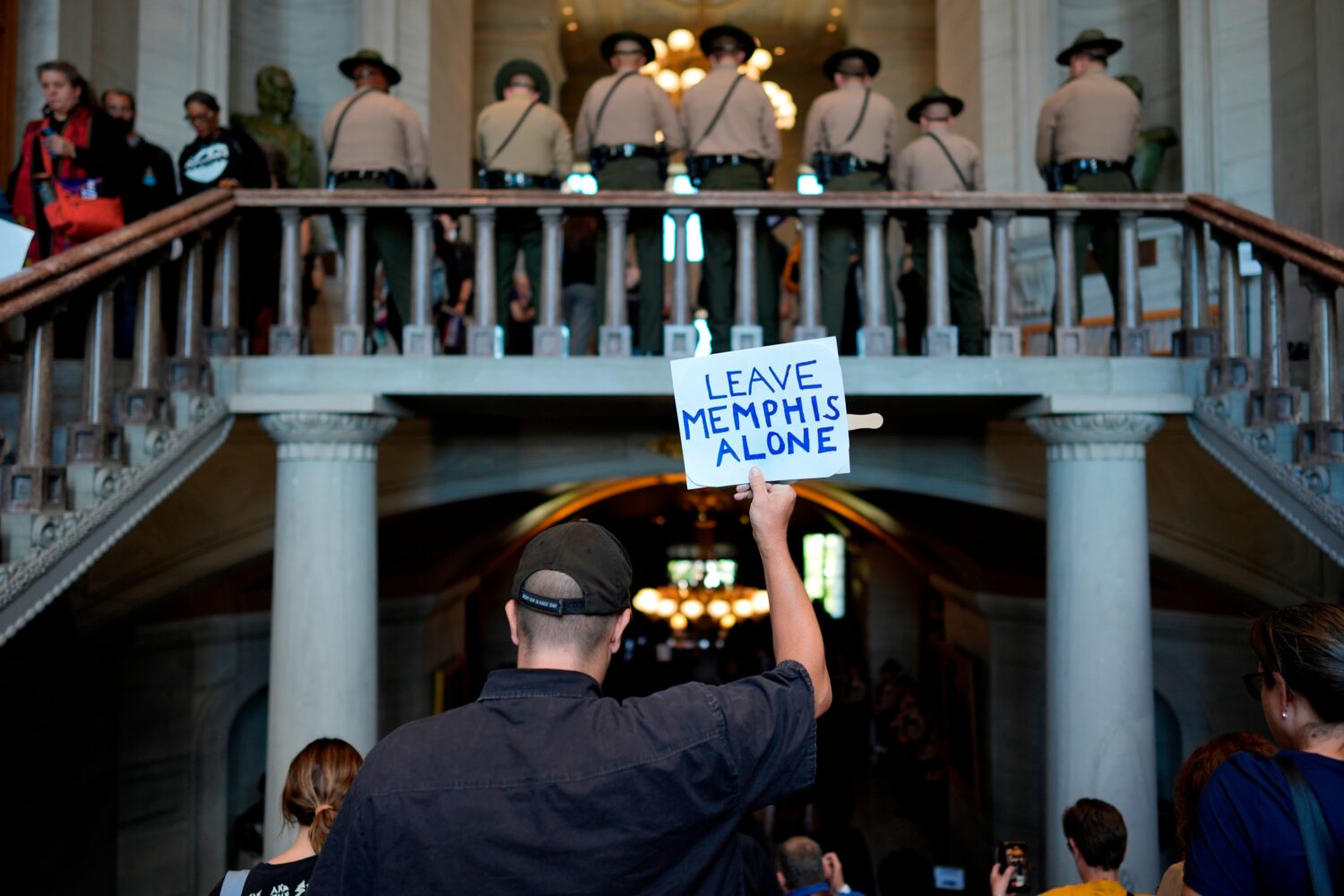 FILE - A person leaves the state Capitol after a special session of the state legislature to redraw...
