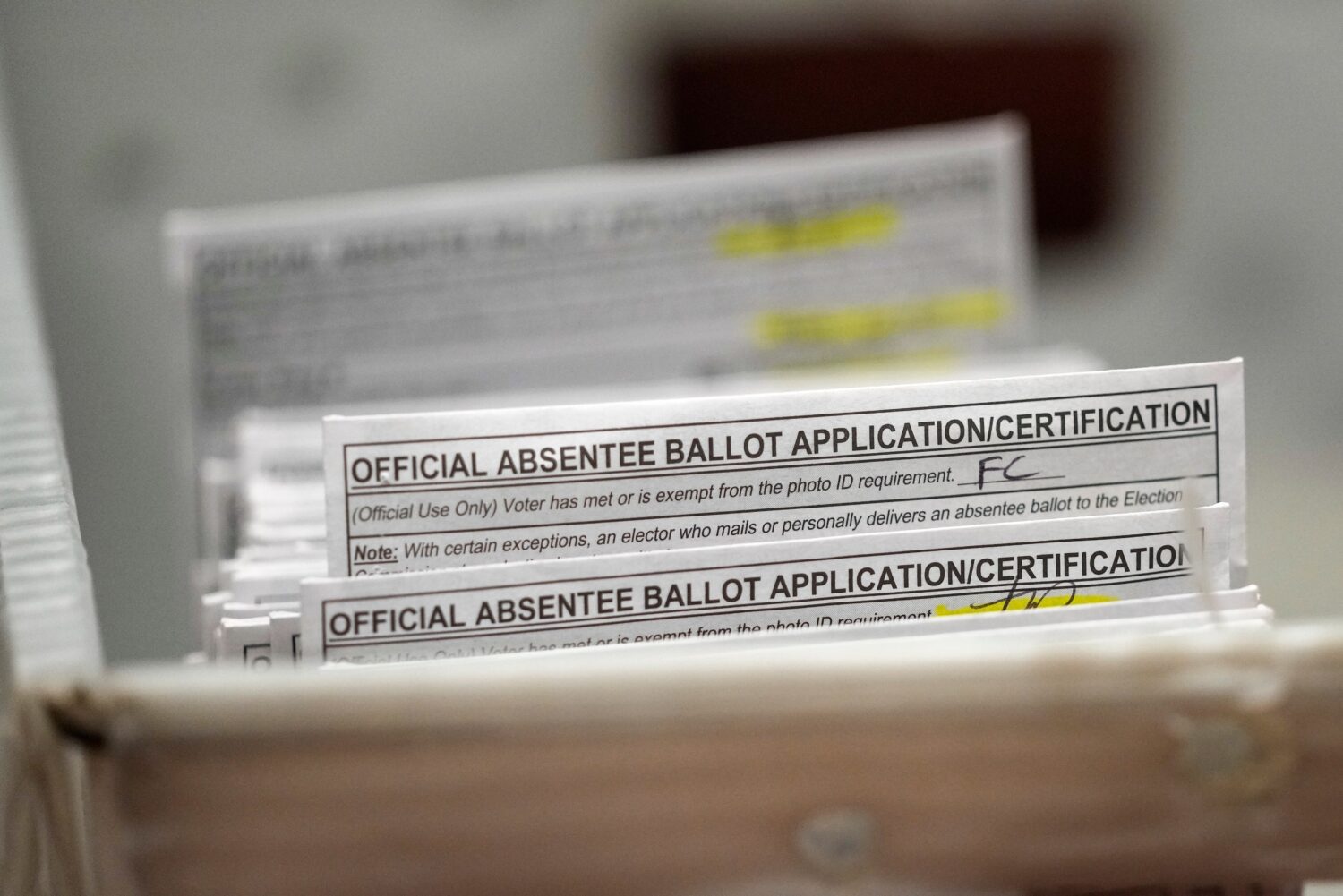 FILE - Absentee ballots during a count at the Wisconsin Center, Nov. 8, 2022, in Milwaukee. (AP Pho...