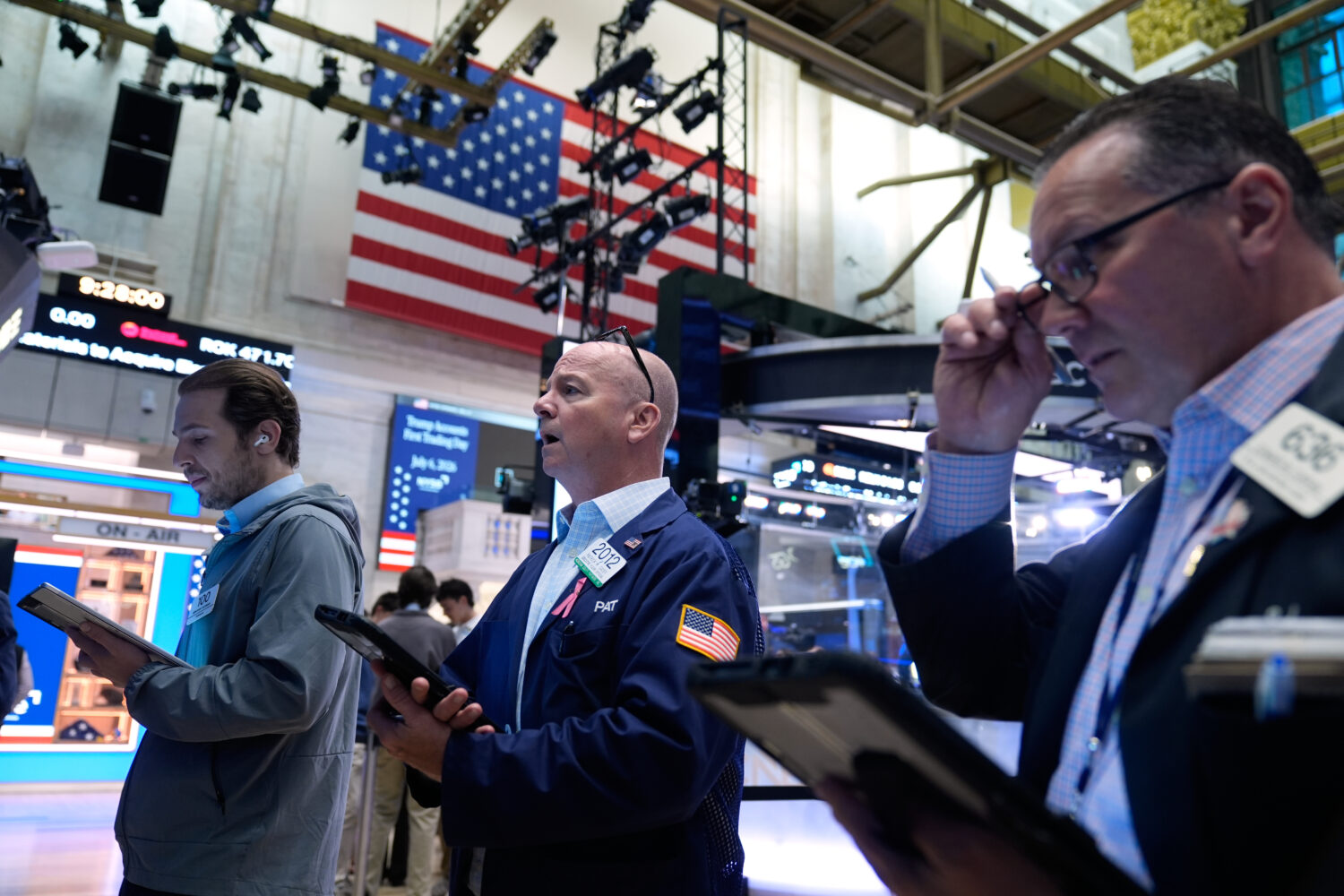 Traders work on the floor at the New York Stock Exchange in New York, Monday, July 6, 2026. (AP Pho...