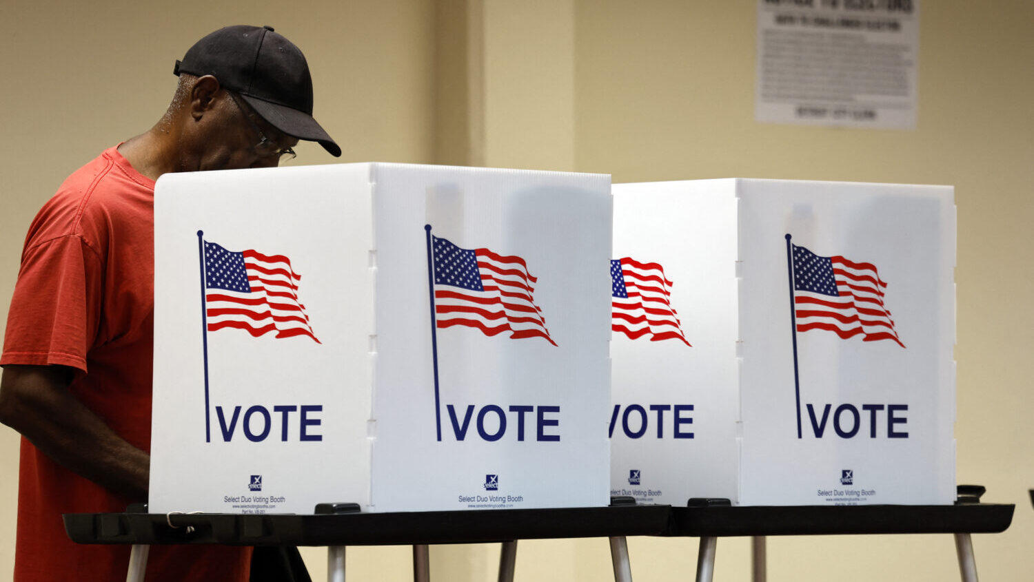 In this Oct. 29, 2024, file photo, voters cast early ballots at the Northwest Activities Center in ...