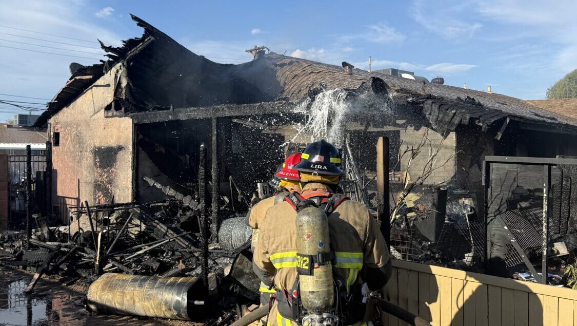 Authorities are investigating a first alarm house fire in Scottsdale that left two dogs dead on Sun...